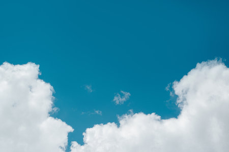Nature, weather, sky landscape. White soft clouds on blue clear sky on sunny summer day outdoors,...