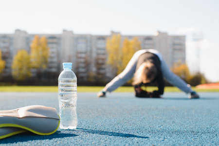 Weight loss, sport, active lifestyle concept. Unrecognizable overweight woman exercising on outdoor...