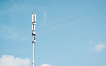 Telecommunication modern cell tower against sky outdoors, copy space.の写真素材