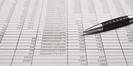 Investment, business and finance, accounting concept. Close-up of a gray pen lying on documents with numbers. Low angle view, selective focus.の写真素材
