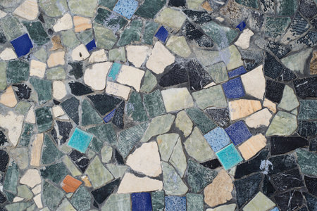 Old mosaic, shabby ceramic decorative tiles texture background.