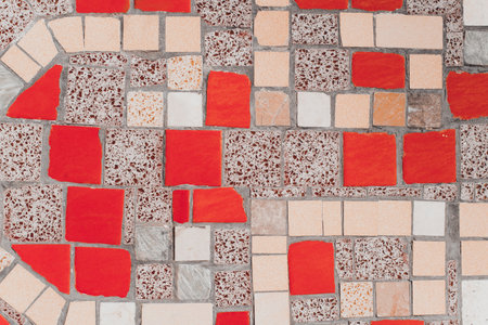 Old decorative ceramic tiles, yellow-red pattern design backgroundの写真素材