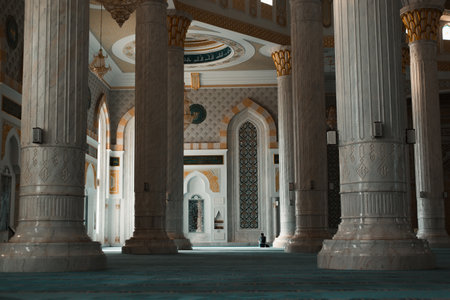 The prayer hall of the mosque, large marble columns. Inside a religious Muslim temple building. Kazakhstan, Astana 05.10.2022.の写真素材