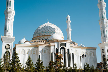 White Great Mosque. Beautiful oriental religious architecture against a clear sky, exterior.の写真素材