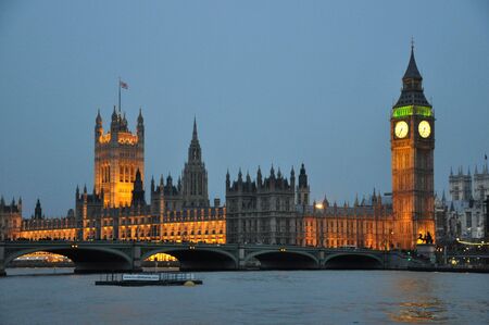 Night view of Parliament and Big Ben in London with reflection in Thames riverのeditorial素材