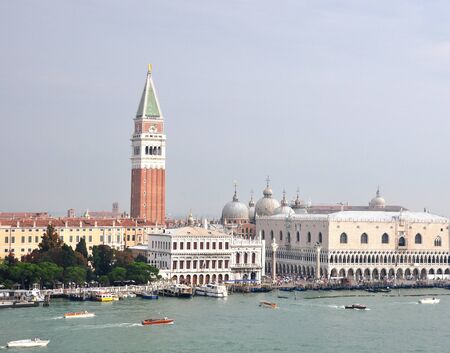 View of the square and Cathedral of Saint Mark and the Campanille in the city of Venice with the Grand Canal full of ships sailingのeditorial素材