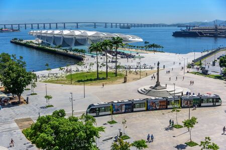 RIO DE JANEIRO, BRAZIL - DECEMBER 28, 2016: Aerial view of the Museum of Tomorrow, Light Rail passing Maua Square and Porto Maravilha with Rio-Niteroi Bridge on the backgroundのeditorial素材