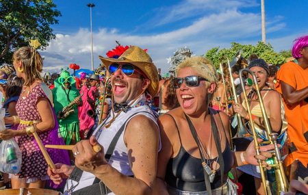 RIO DE JANEIRO, BRAZIL - FEBRUARY 28, 2017: Funny man and woman of Bloco Orquestra Voadora playing...