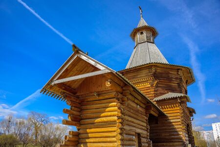 Spring view of the wooden Travel Tower of the Nikolo-Korelsky Monastery in the Kolomenskoye Museum at sunny day, Moscow, Russiaの写真素材