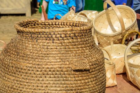 Handmade braided barrel and wicker baskets at international knight festival Tournament of Saint George in the Kolomenskoye museum-reserveの写真素材