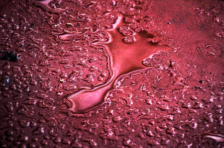 red steel plate with rainwaterの写真素材