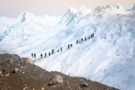 climbing to the top of the Perito Moreno glacierの写真素材