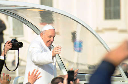 Vatican, Rome / Italy; 01/27/2016: Pope Francis at the end of the papal audience says goodbyeのeditorial素材