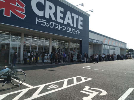 Fuji City, Shizuoka Prefecture, Japan - April 4, 2020: Queue of people to buy mask for protection...