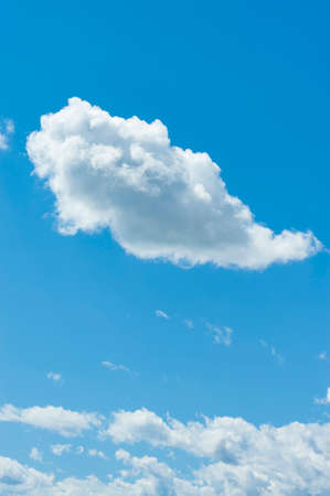 Wonderful blue sky with white clouds in winter afternoon in Fuji City, Japan. Vertical shot.の写真素材