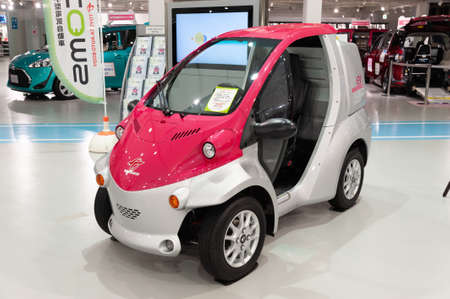 Odaiba, Tokyo, Japan - January 2, 2020: The Super-Compact Electric Vehicle COMS. Front view.