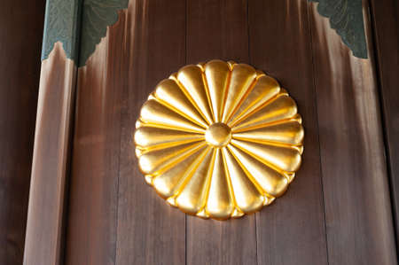 Chiyoda City, Tokyo, Japan - January 02, 2020: Crest in shape of chrysanthemum flower on gate of Yasukuni Jinja shrine, imperial symbol of the Japanese Emperor.のeditorial素材