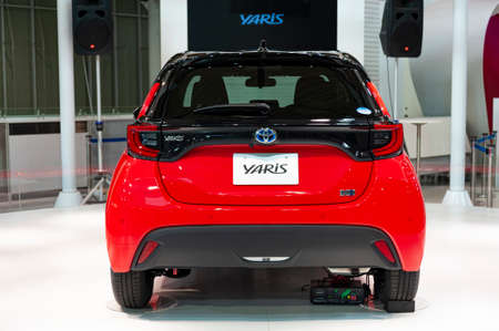 Odaiba, Tokyo, Japan, Toyota Showcase Mega Web Palette Town - January 2, 2020: Red Toyota Yaris.