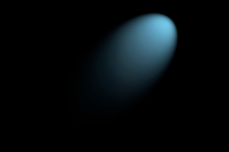 Bluish light tunnel on black background.の写真素材