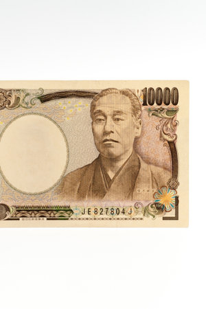 Front view of 10000 yen note in close-up isolated on white background.の写真素材