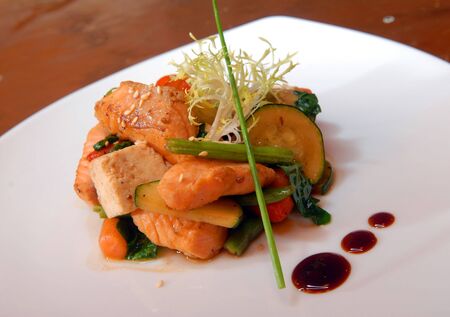 Salad of grilled vegetables with slices of salmonの写真素材