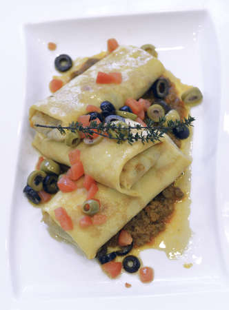 pancakes with meat and sauce bologneseの写真素材