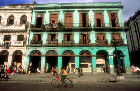 Capitolio Bar and buildings In front of National Capitolio, Paseo Marti, Havana (La Habana), Cuba. Pastel painted buildings with antique car in foreground, Capitolio, Havana, Cubaのeditorial素材