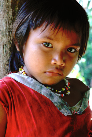 A girl portrait in the Orinoco River. The Warao are an indigenous people inhabiting northeastern Venezuela and western Guyana. Alternate common spellings of Warao are Waroa, Guarauno, Guarao, and Warrau. The term Warao translates as "the boat people," aftのeditorial素材