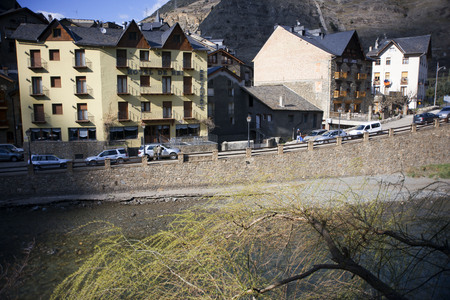 View of Llavorsi village located along river Noguera Pallaresa in province of Lleida Catalonia Spainのeditorial素材