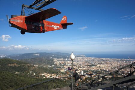Airplane carousel in Tibidabo Amusement Park, Tibidabo, Barcelona, Spain. The Tibidabo theme park, Barcelona, Spain. Tibidabo is a mountain overlooking Barcelona, Catalonia, Spain. At 512 meters it is the tallest mountain in the Serra de Collserola. Risinのeditorial素材