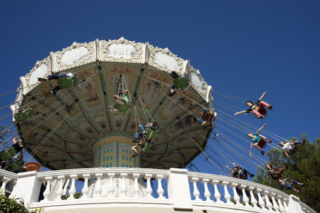 Carrousel, Tibidabo, Barcelona. The Tibidabo theme park, Barcelona, Spain. Tibidabo is a mountain overlooking Barcelona, Catalonia, Spain. At 512 meters it is the tallest mountain in the Serra de Collserola. Rising sharply to the north-west, it affords spのeditorial素材