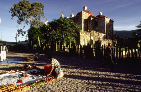 Selling handicrafts near Church of San Pablo, Mitla, Oaxaca, Mexico. The Church of San Pablo (St. Paul), built by the Spanish in the 16th century on the ruins of Mitla.のeditorial素材