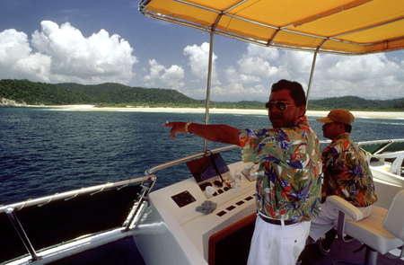 Captain of "Mi amor" cruise boat in Bahias de Huatulco, Oaxaca, Mexicoのeditorial素材