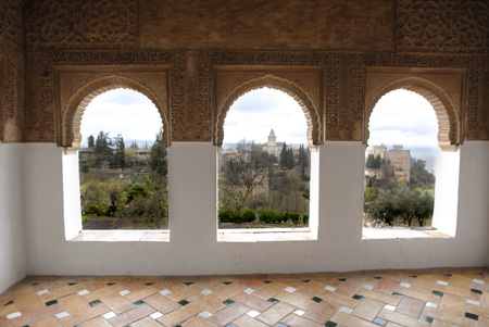 Decorated arches and windows of the Mexuar Courtyard of the Comares Palace in the Alhambra in Granada, Andalucia, Spainのeditorial素材