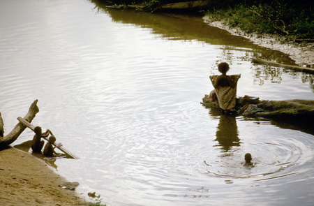 Orang Asli tribe in Taman Negara National Park in central Malaysia. Woman cleaning the cloths.のeditorial素材
