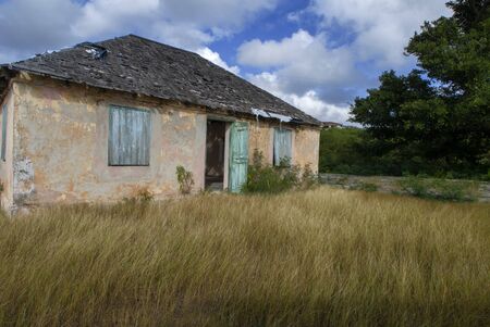 Cat Island, Bahamas. Old house next to the Beach of the East (Atlantic) area Pine Bay, Cat Island.