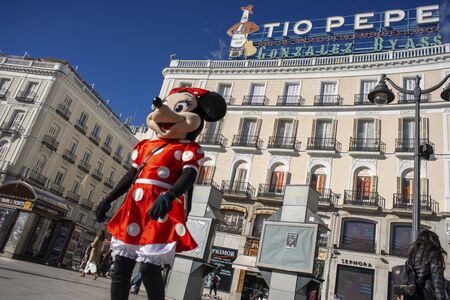 Minnie mouse costume in Puerta del Sol square in the city centre, Madrid, Spainのeditorial素材