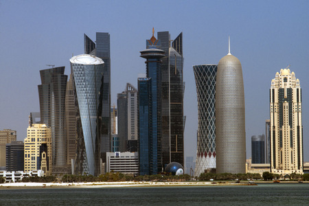Skyline with the skyscrapers in the financial area of Doha, the capital of Qatar in the Arabian Gulf countryのeditorial素材