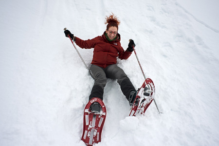 Baqueira Beret, Ski resort, Pyrenees, Aran Valley, Lleida, Catalonia, Spain. People walking with snow rackets towards the summit of a snowy hill.のeditorial素材