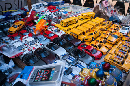 SOUVENIRS GIFT SHOP WINDOW MANHATTAN NEW YORK CITY USA. Toy cars modelled on New York city yellow taxisのeditorial素材