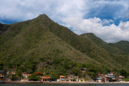 Boats in Chuao beach in Falcon state in Venezuela - Henri Pittier National Park, in Venezuela.  It presents a big touristy interest, by being one of the starting points towards the islands of Morrocoy National Park, together with Tucacas. There, you can hのeditorial素材