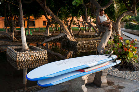 Surfer in Choroni in Falcon state in Venezuela - Henri Pittier National Park, in Venezuela.  It presents a big touristy interest, by being one of the starting points towards the islands of Morrocoy National Park, together with Tucacas.のeditorial素材