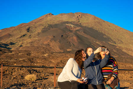 Tourists at Teide peak and Mountain landscape at Las Canadas, Parque Nacional del Teide, Tenerife, Canary Islands, Spainのeditorial素材