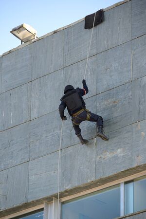 Club of stuntmen shows to people of the city a simulation of training of police special forces in Vilagarcia de Arousa, Galicia, Spain. June 16, 2014.のeditorial素材