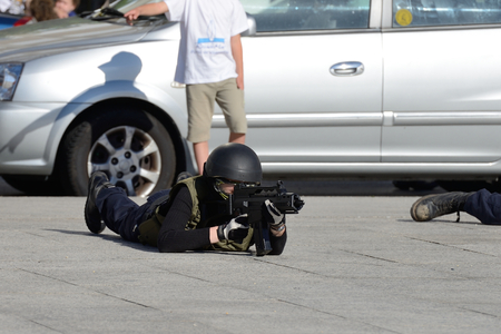 Club of stuntmen shows to people of the city a simulation of training of police special forces in Vilagarcia de Arousa, Galicia, Spain. June 16, 2014.のeditorial素材