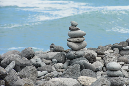 pyramid stones on the seashore world of balance