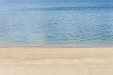 image of coastline yellow sand and blue sea water landscape