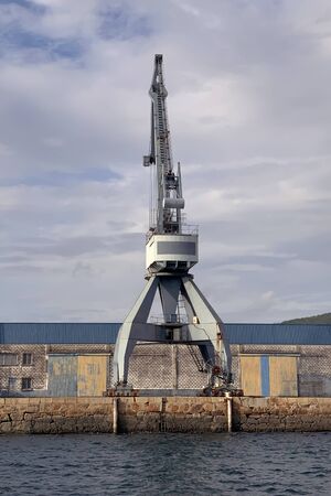 view of Industrial harbor cranes in the seaportの写真素材