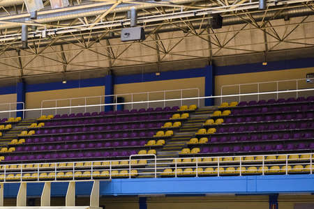 empty rows of seats in the stands of the sports hallの写真素材