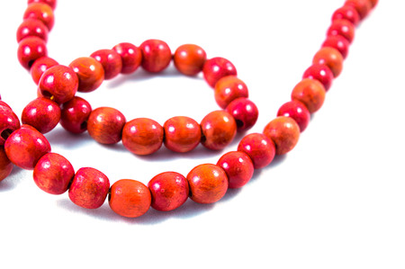 red beads on white background,decoration, pearl, jewelry, bead, bright, ornamentの写真素材